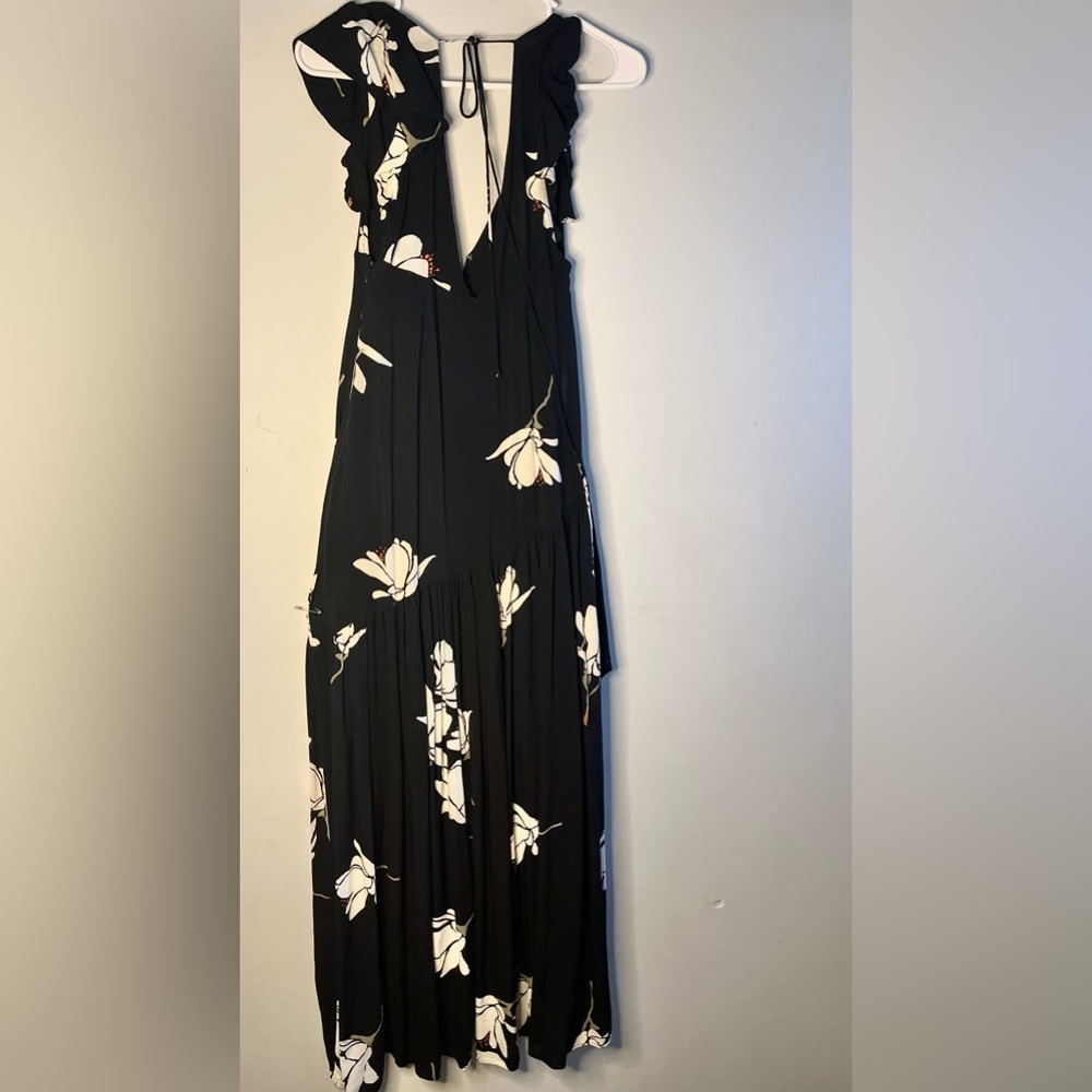 Free People Long black dress with floral white print.